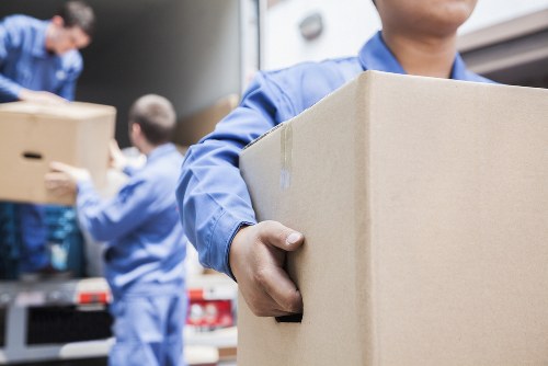 Student removals team preparing boxes in a Paddington flat