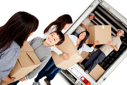 Movers preparing equipment safely before a relocation task