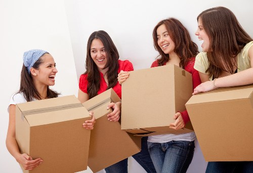 Furniture pick-up team handling bulky sofa removal in Paddington