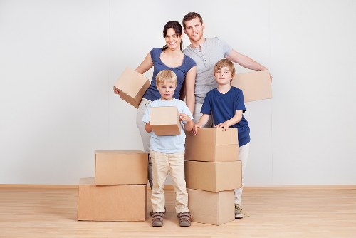 Packing and loading belongings into a moving truck in Paddington