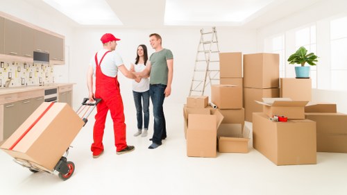 Business moving team handling office furniture and equipment in Paddington