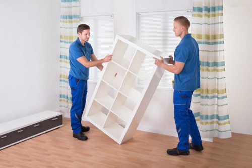 Organised student relocation with packed boxes and furniture ready for transport