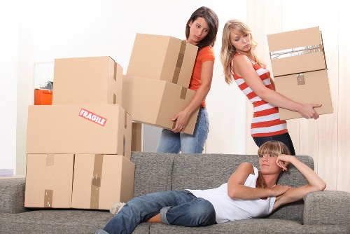 Movers reviewing health and safety standards before starting work