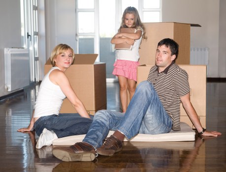 Professional movers handling furniture during a Paddington move